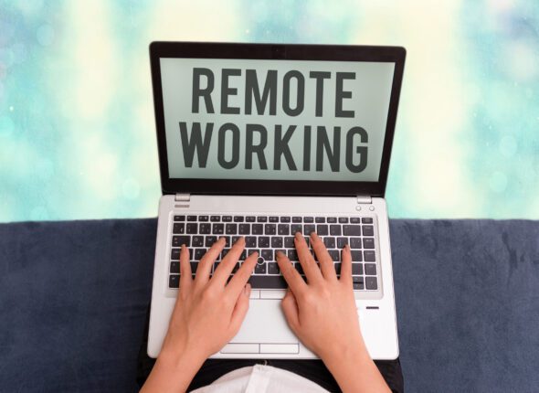 Conceptual hand writing showing Remote Working. Business photo showcasing situation in which an employee works mainly from home.